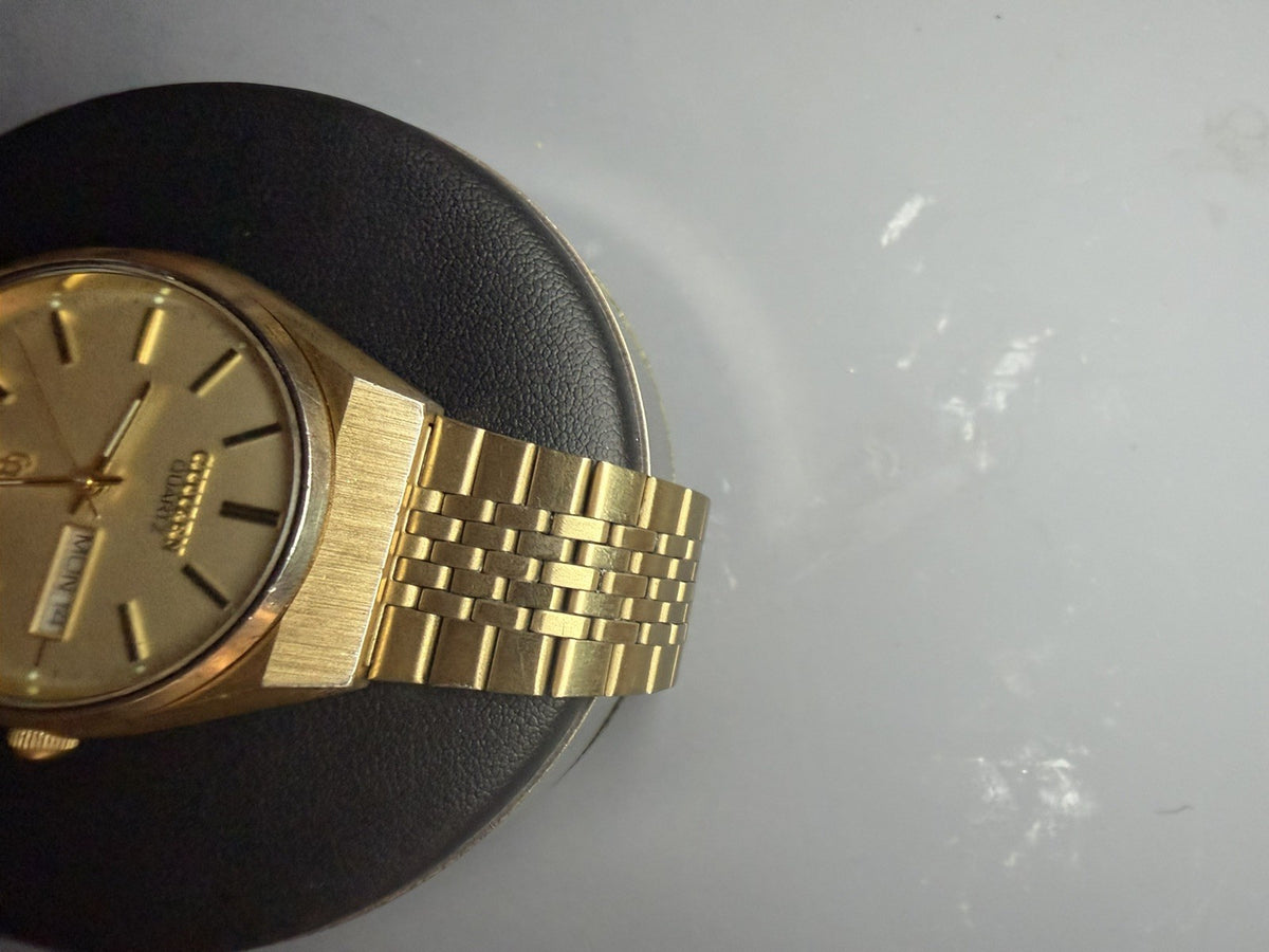 Vintage Citizen CQ Men’s Gold Tone Stainless Steel Day Date Presidential Watch